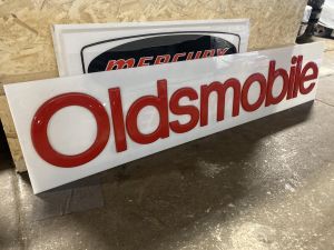 Oldsmobile dealer sign