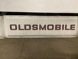 Oldsmobile dealership sign