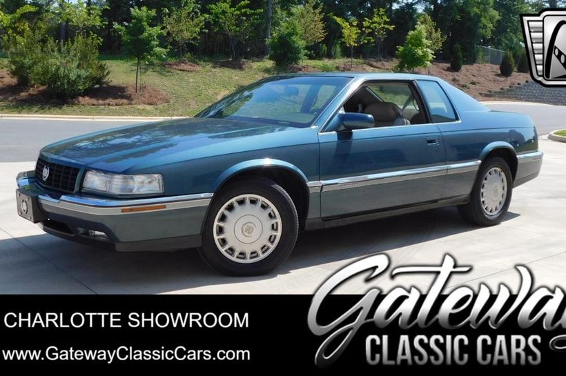1993 Cadillac Eldorado 1G6EL1299PU609401 Dark green grey metallic Tan