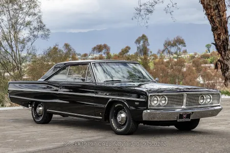 The first Funny Car - Dick Landy's Dodge Hemi Coronet heads to